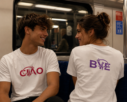  white t-shirts with ciao in the front e bye in the back.Two people sitting on a subway train wearing the tees
