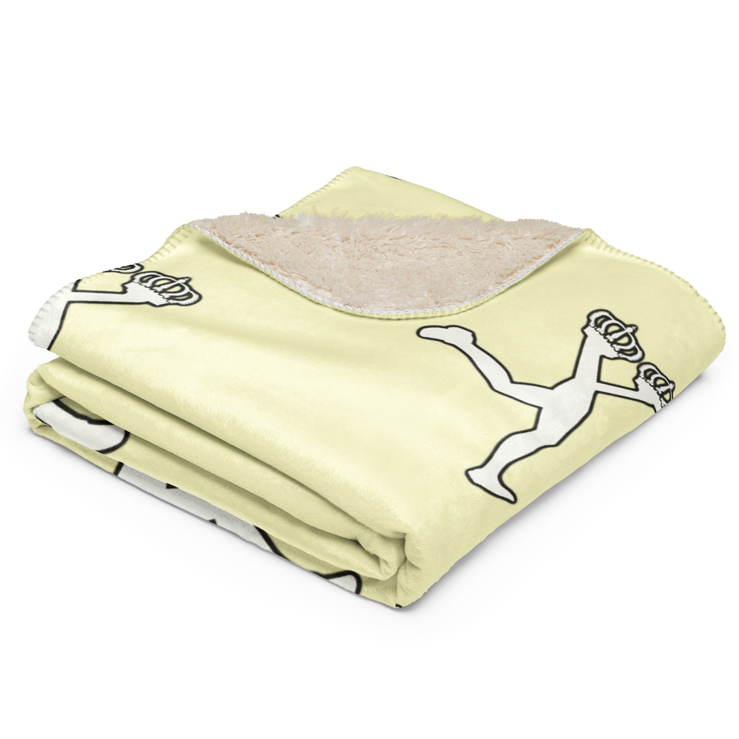 Folded cream blanket with black and white graphics of the character of Lux on a white background