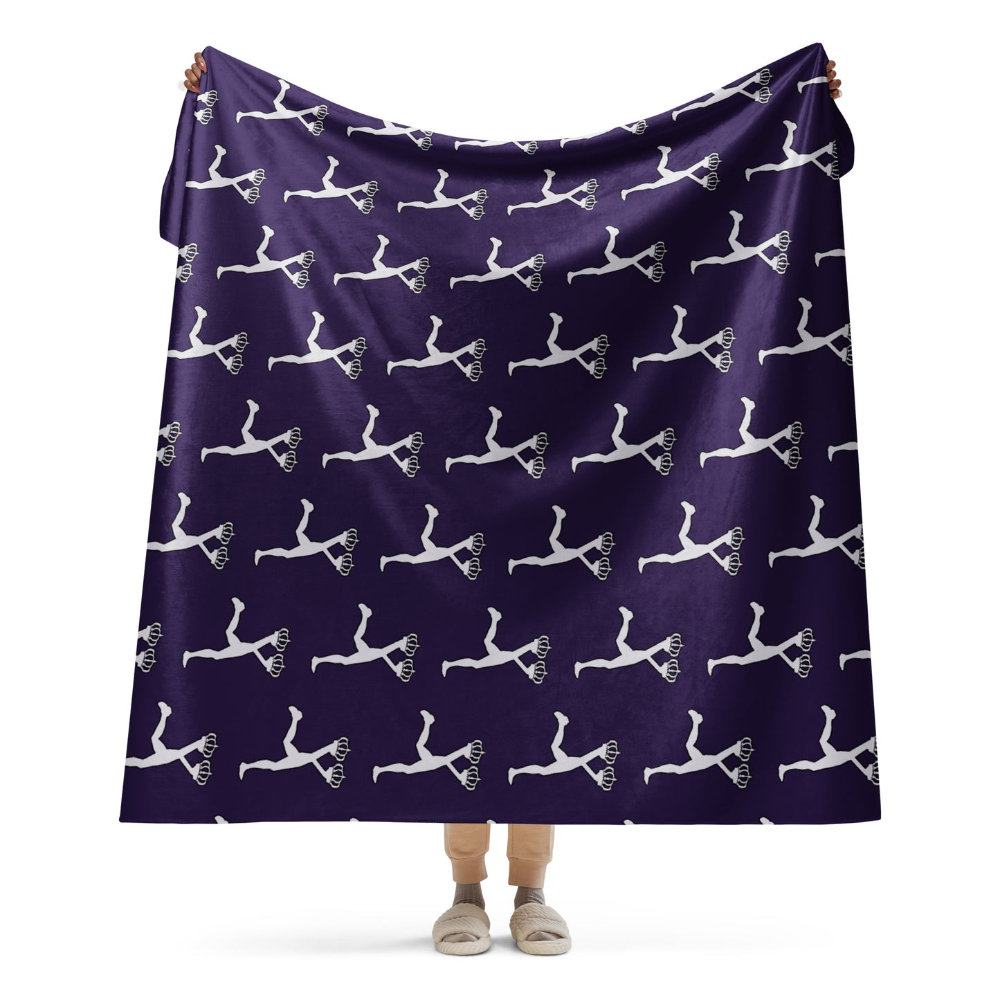 Person holding a purple blanket with white Lux mascot patterns on a white background