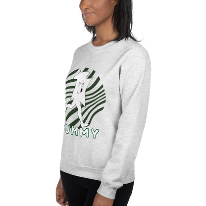 Person wearing a gray sweatshirt with a graphic design of ummy in the white edition on a circle with dark green lines as a background and the text "Yummy" 
