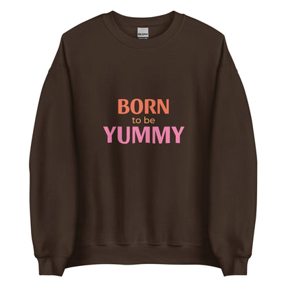 Brown sweatshirt with 'Born to be Yummy' text on a pink and orange background