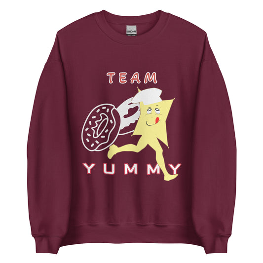 Marron sweatshirt with cartoon character and text 'Team Yummy' on a white background