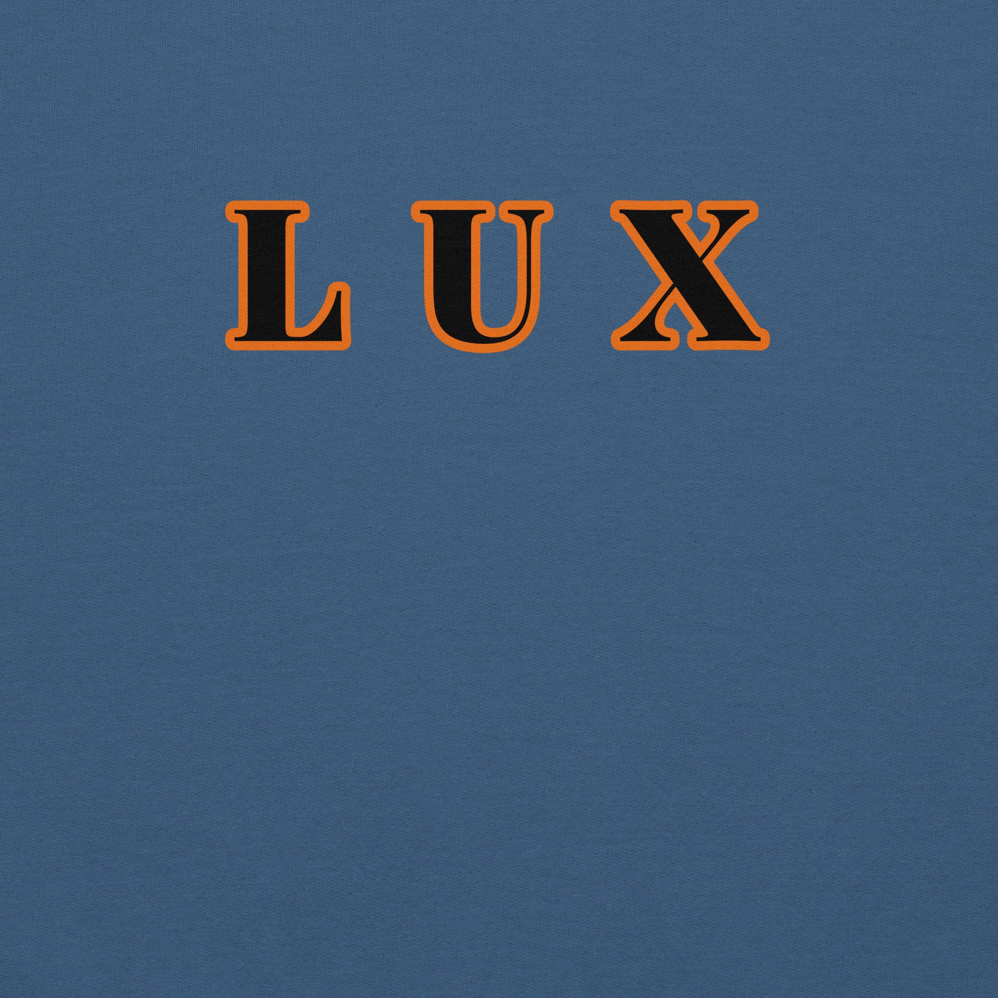 Closeup of a hoodie with the word 'LUX' in orange and black on a blue background