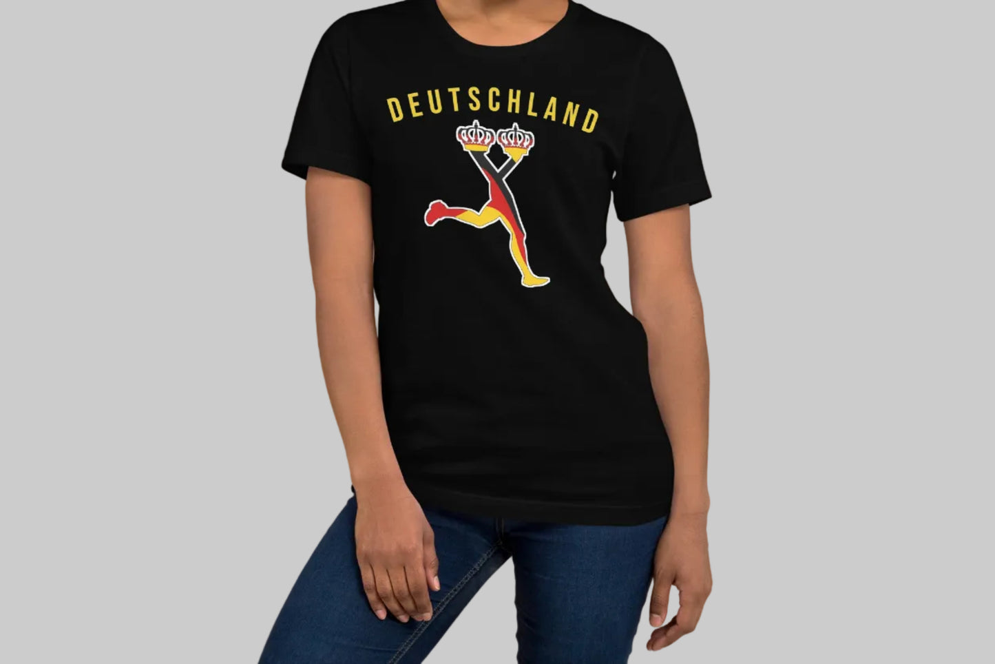 Woman wearing a black t-shirt with text Deutschland and design with the German flag
