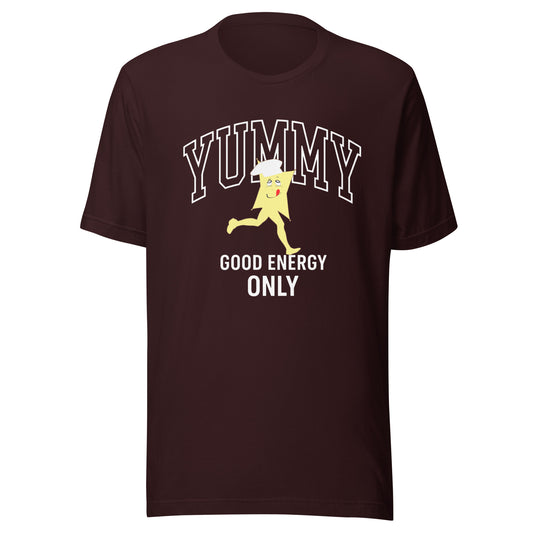 Brown t-shirt with a graphic of a cartoon character YUMMY and text "good energy only"